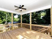 Covered Deck with Beadboard Ceiling in The Ashford built by Waterford Homes in Brookhaven